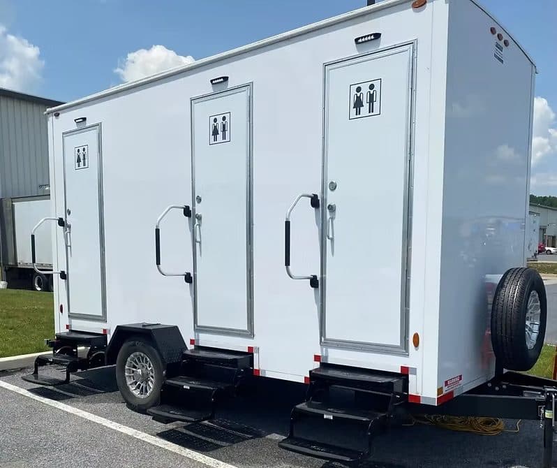 Three-station luxury restroom trailer ready for an event